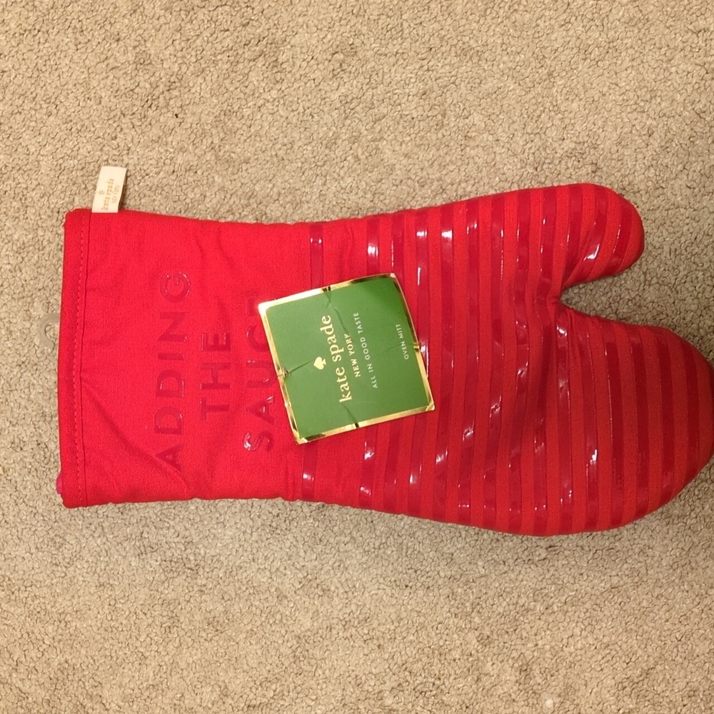 NWT Kate Spade red oven mitt. Adding the sauce.